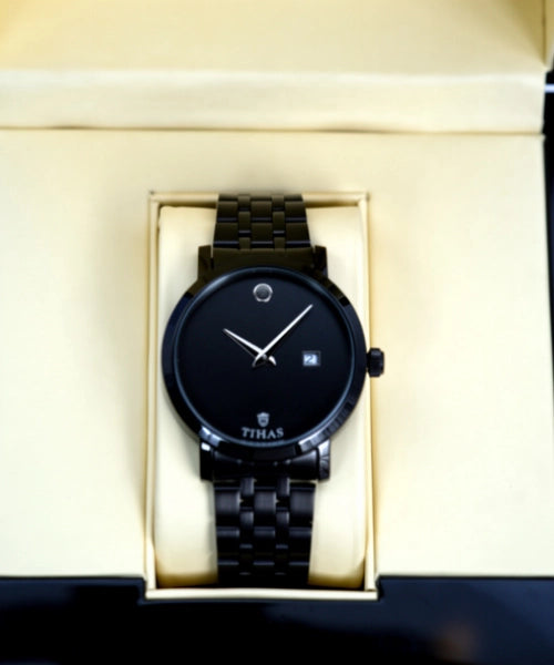 Black wristwatch in a box with 'TIHAS' branding